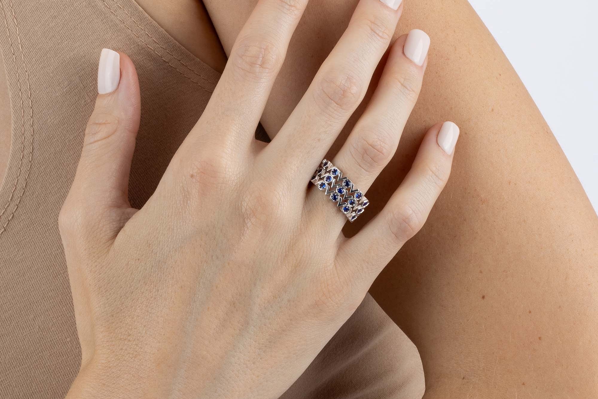Stack of three White Gold and Blue Sapphire Rings with octagons and V shapes, Medium - Model shot