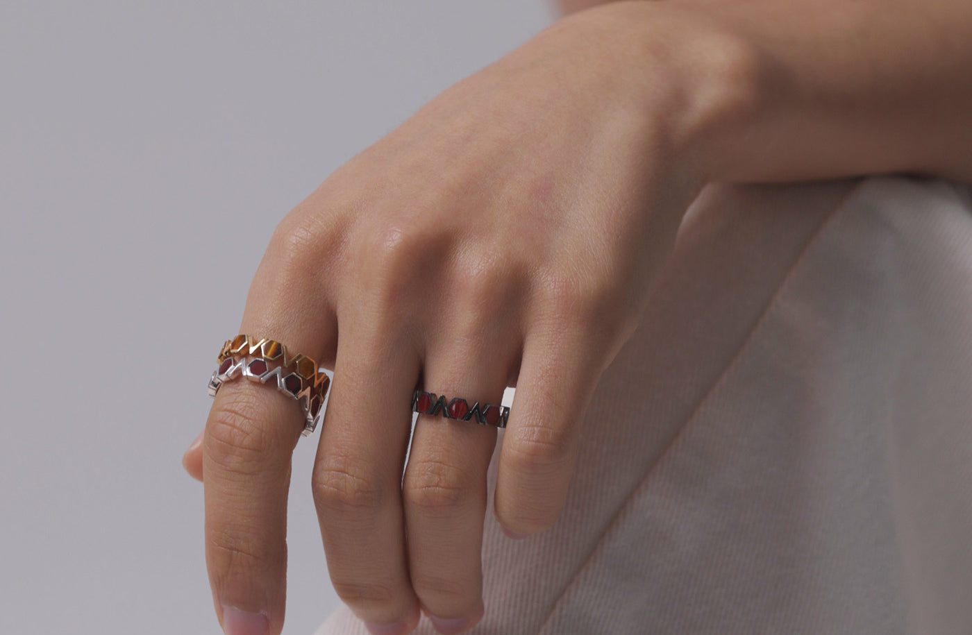 Rhodium Plated Silver Band with repeating Carnelian hexagons and V shapes, Medium - Model shot