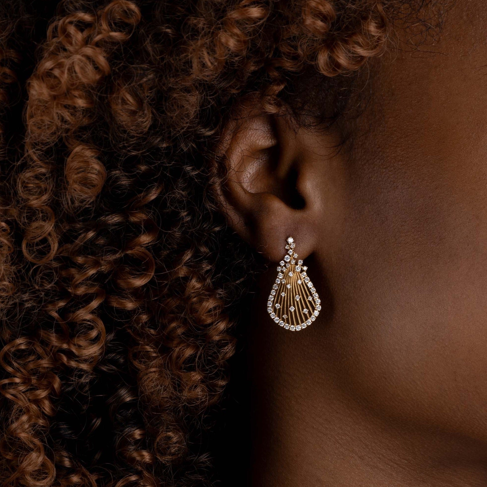 Raindrop shaped Yellow Gold Earrings with small round Diamonds, Medium - Model shot