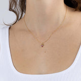 Yellow Gold Necklace with a pear shaped Pink Sapphire and small round Diamonds, Small - Model shot