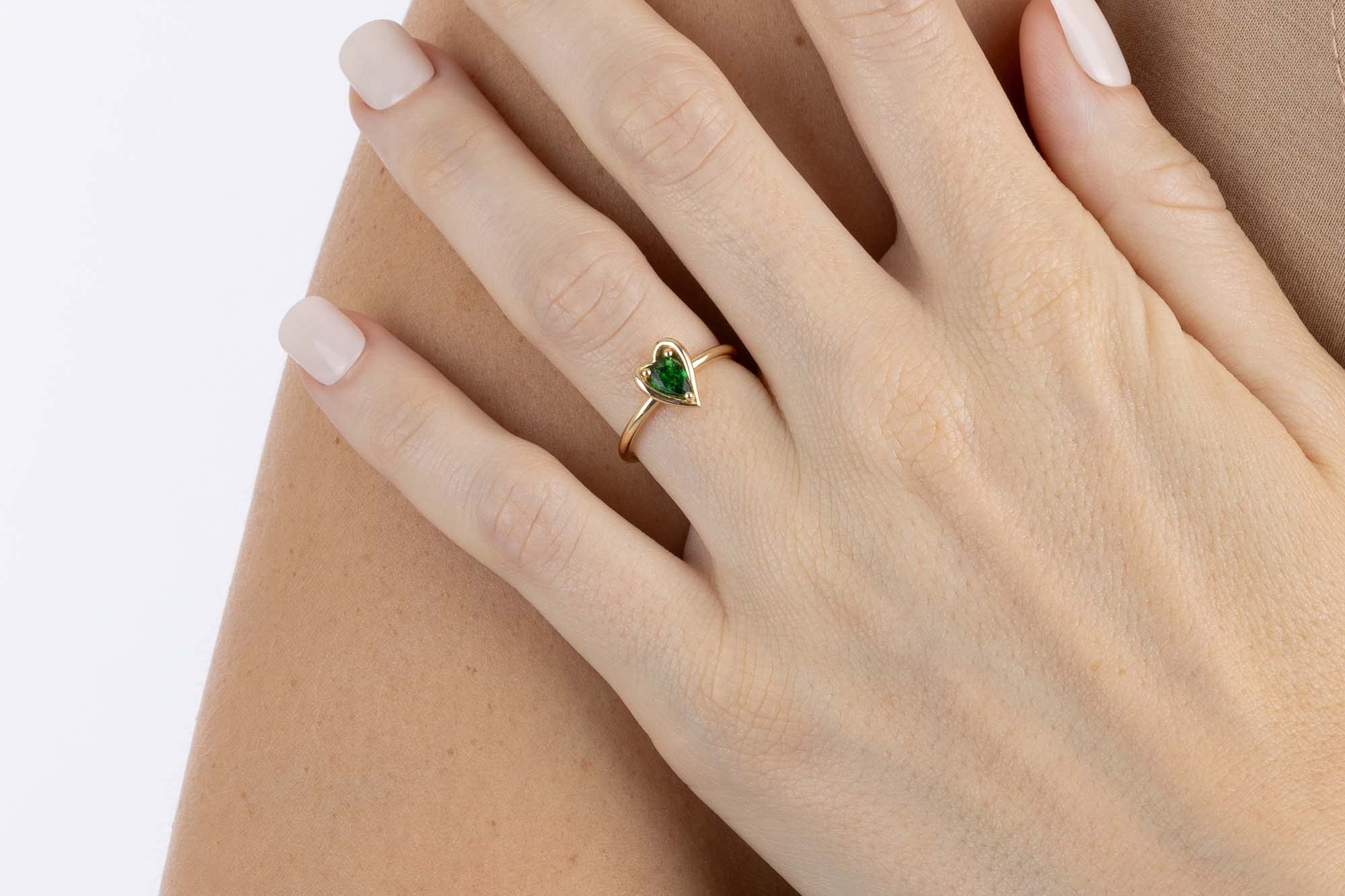 Rose Gold heart shaped ring with a pear shaped Tsavorite, Small - Model shot