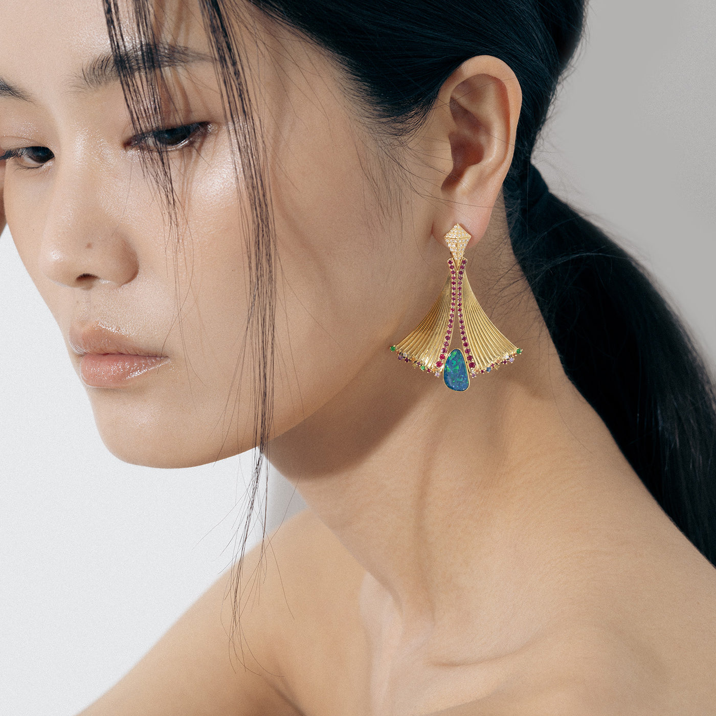 Yellow Gold Earrings with a Black Opal, Diamonds, and Colored Sapphires - Model shot