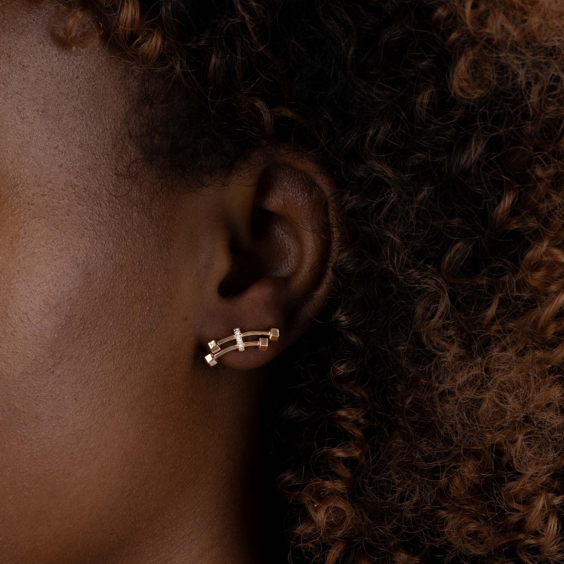 Yellow Gold Earrings with two barbells connected by Diamond encrusted bar, Small - Model shot